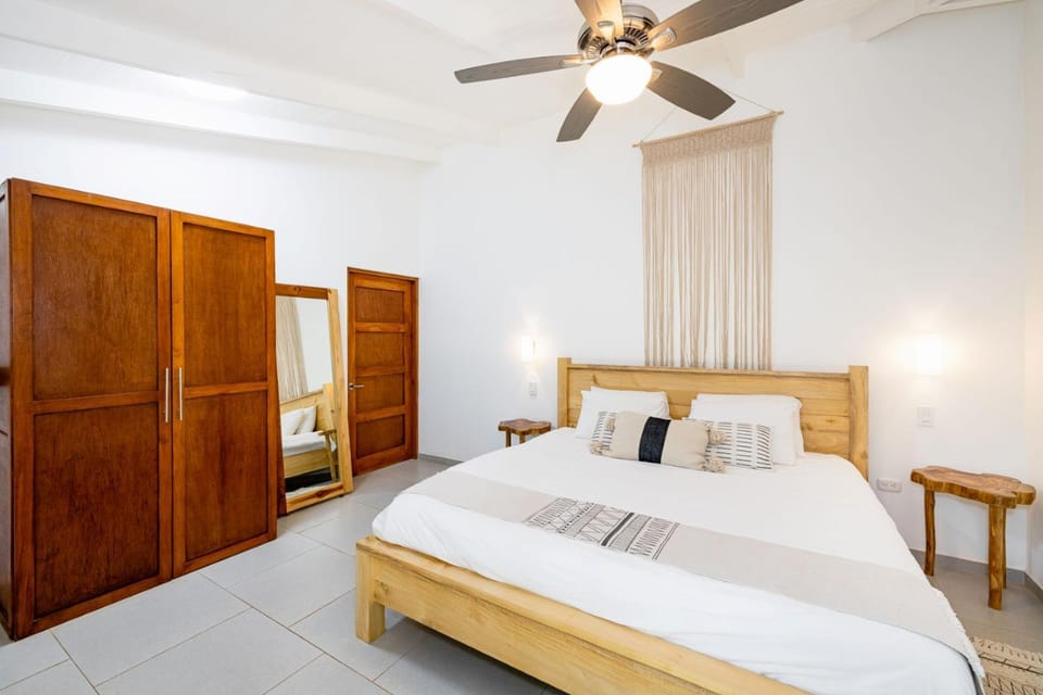 Photo of the whole room, Bedroom, fireplace, wardrobe