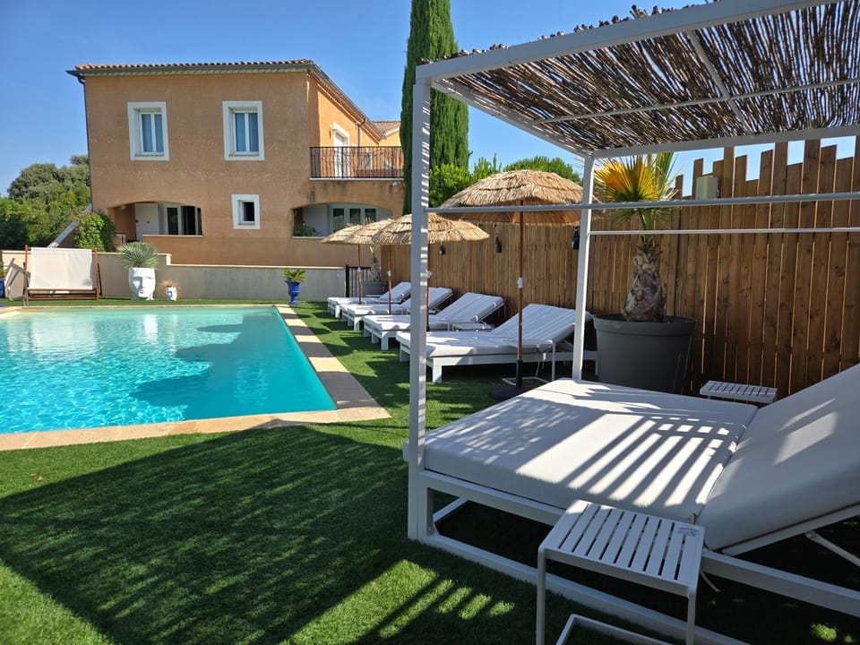 Property building, Pool view, Swimming pool, sunbed