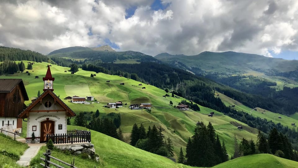 Property building, Nearby landmark, Natural landscape, Mountain view