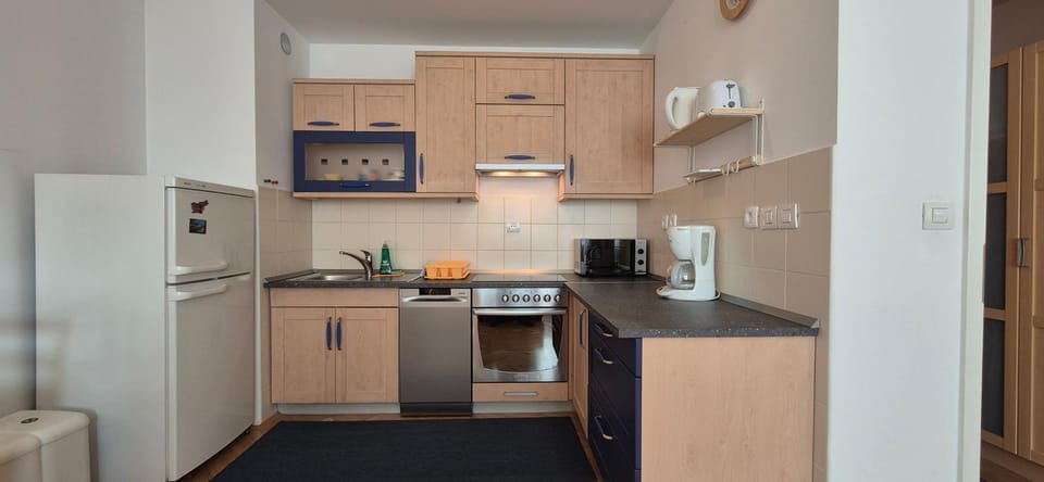 Kitchen or kitchenette, dishwasher, microwave