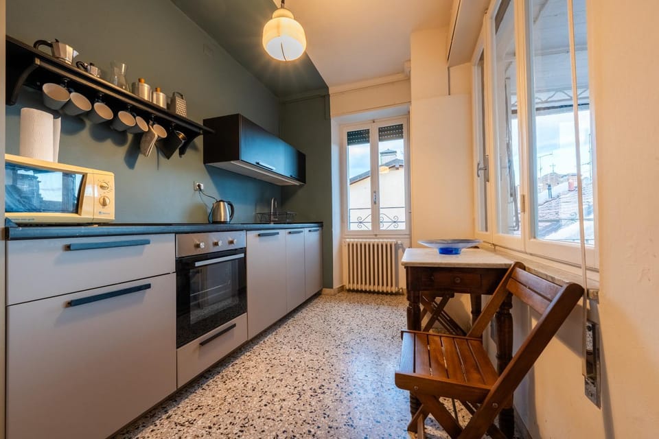 Kitchen or kitchenette, dishwasher, microwave, oven, stove, washing machine