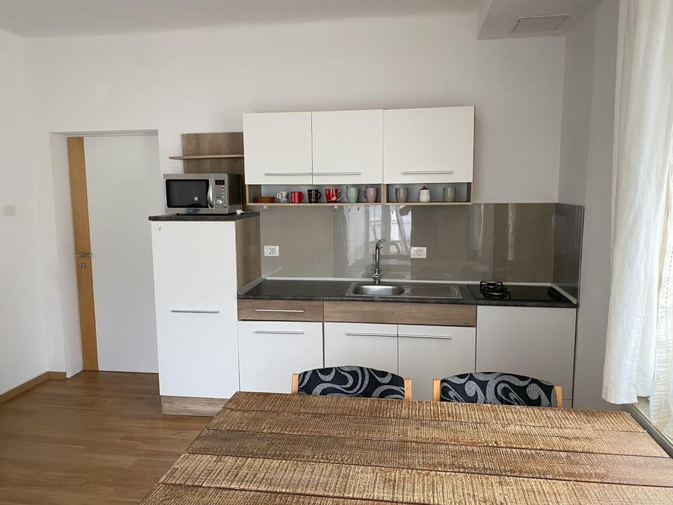 Kitchen or kitchenette, microwave