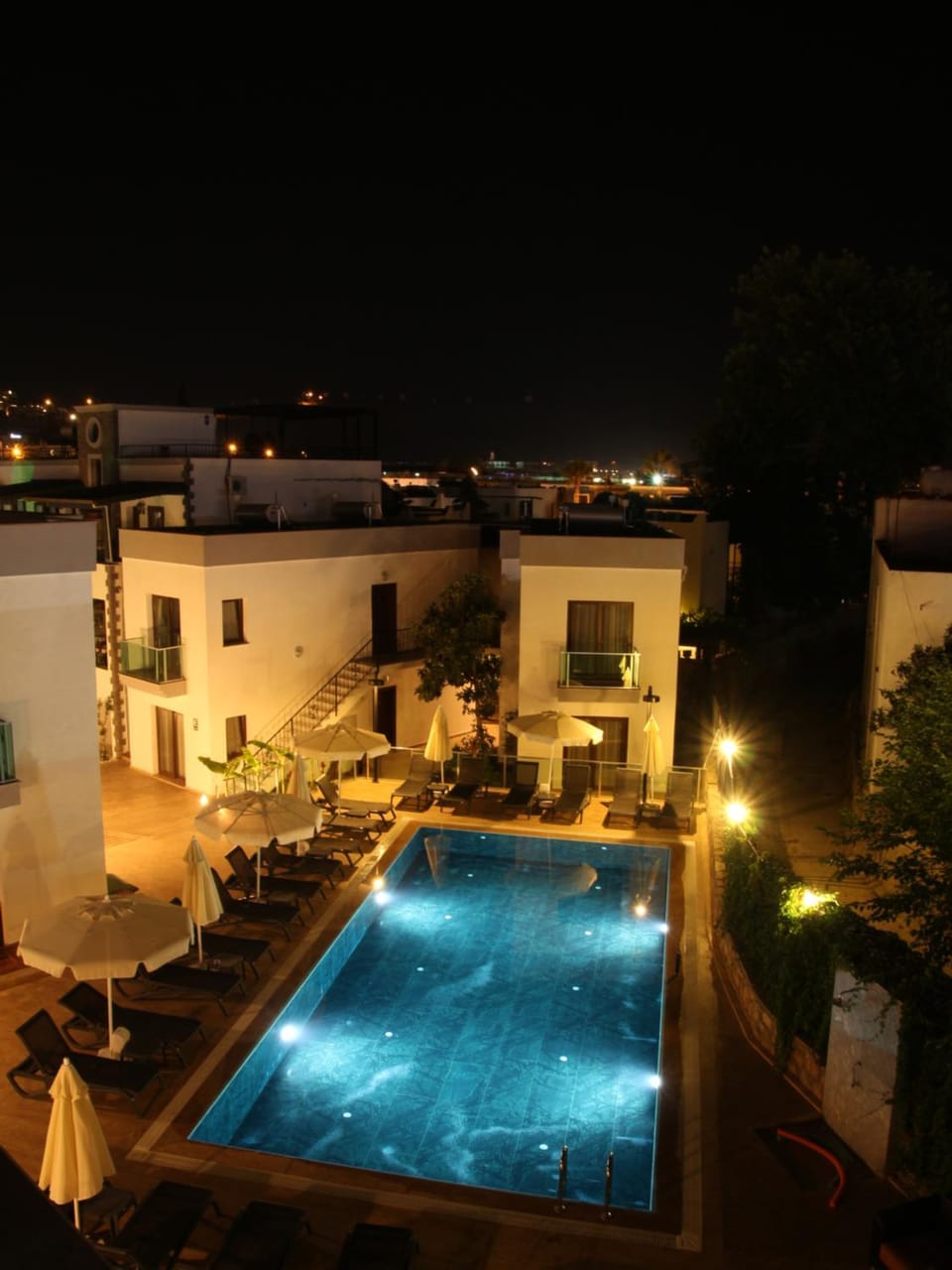 Property building, Night, Pool view, Swimming pool, Swimming pool