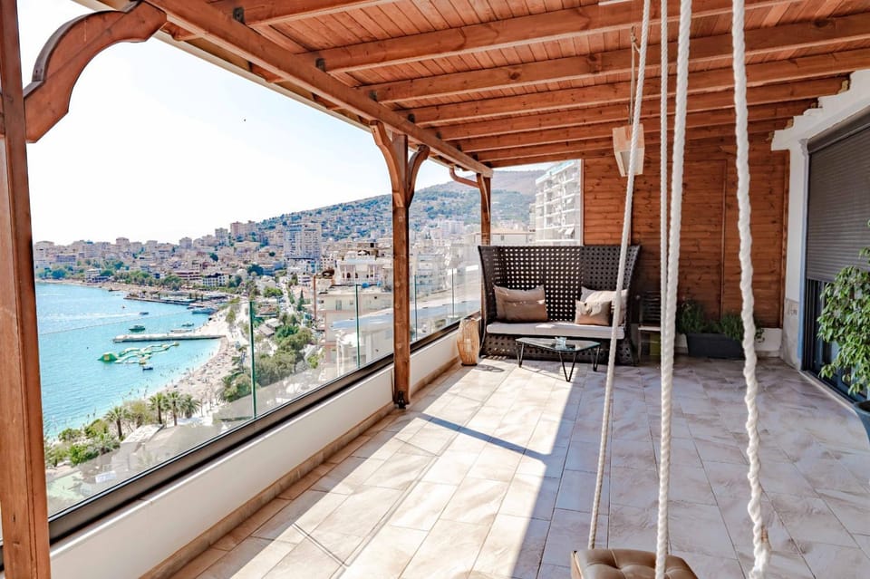Property building, Patio, Day, View (from property/room), Balcony/Terrace, Seating area, Mountain view, Sea view