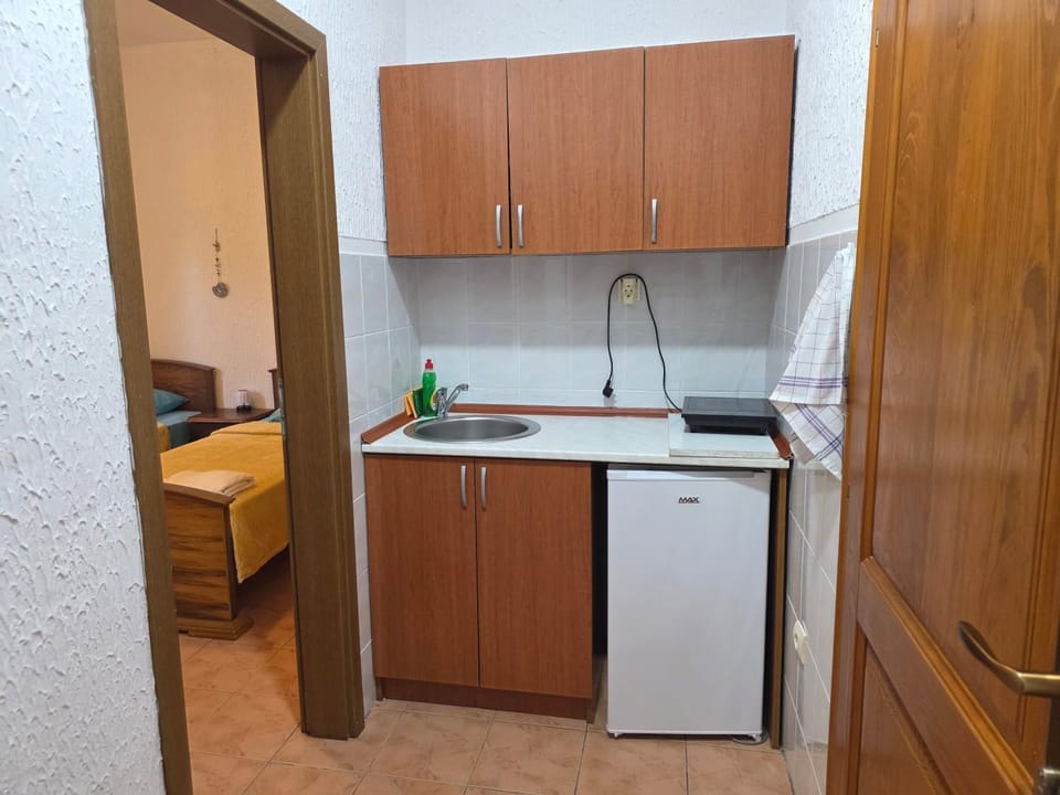 Kitchen or kitchenette, stove