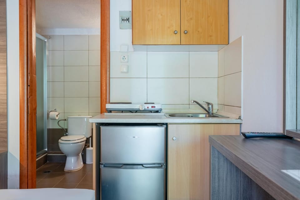 Kitchen or kitchenette, stove