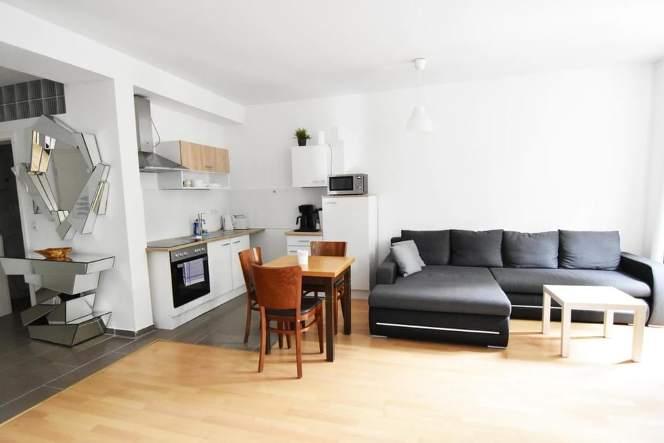 Kitchen or kitchenette, Living room, Seating area, Dining area, stove