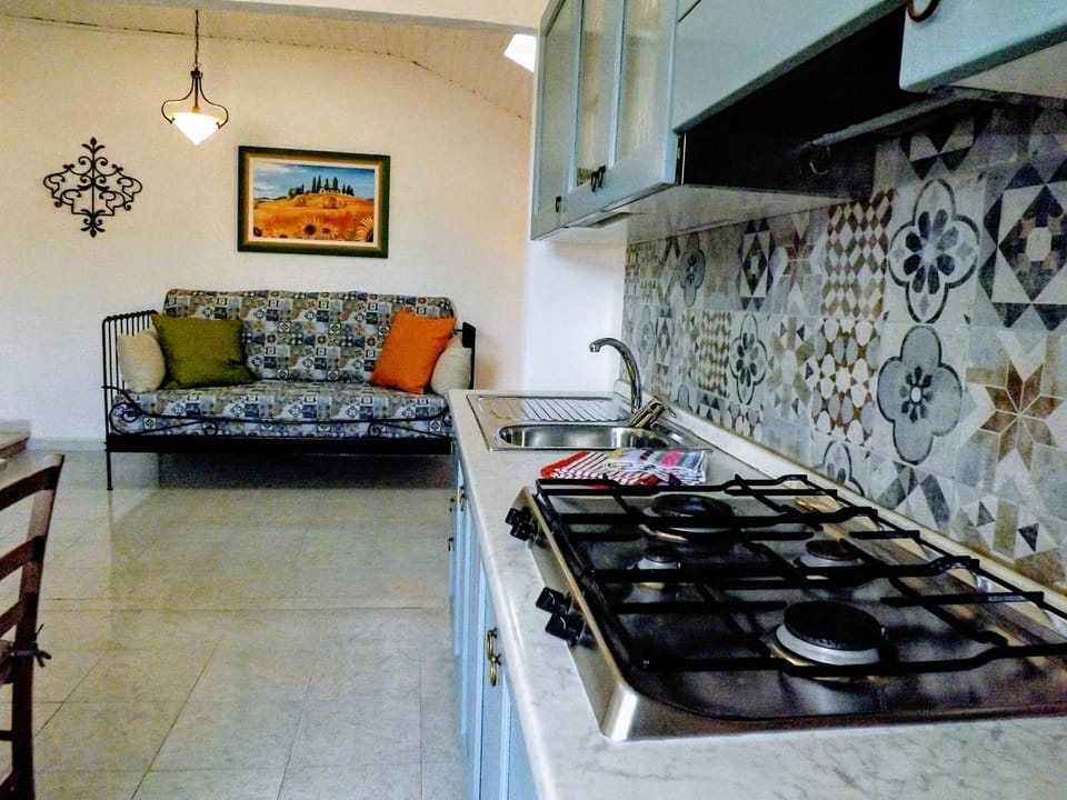 Kitchen or kitchenette, Living room, Seating area, stove