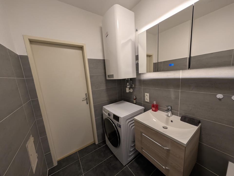 Bathroom, washing machine, dryer