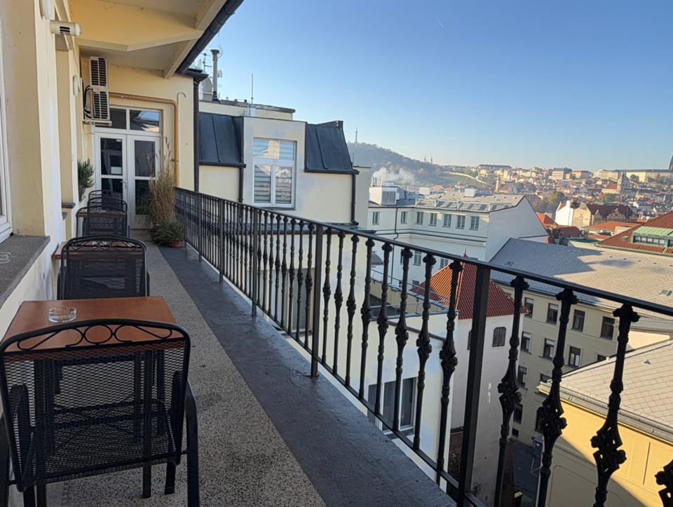 View (from property/room), Balcony/Terrace, Seating area, City view