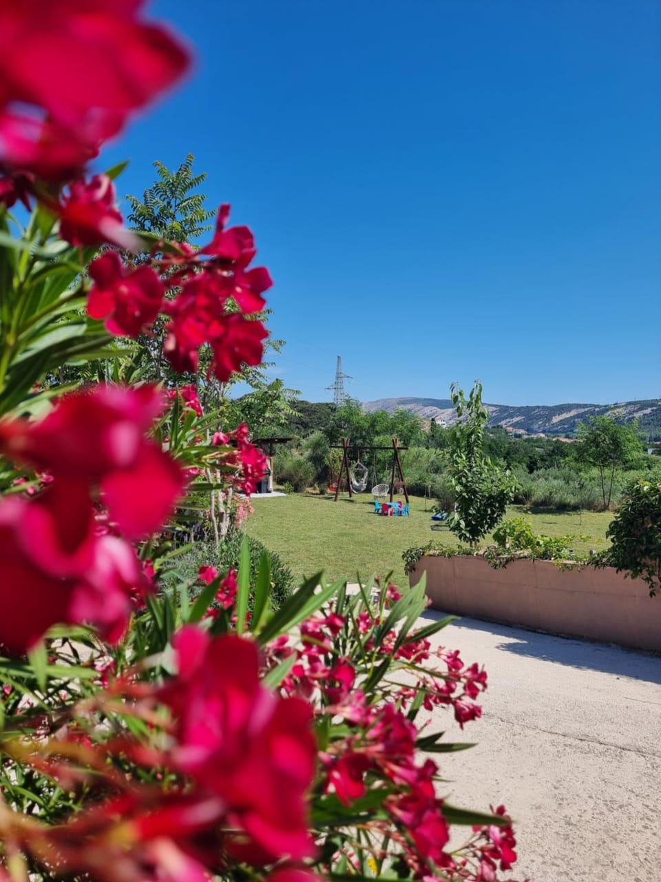 Natural landscape, BBQ facilities, Children play ground, Garden, Seating area, Garden view
