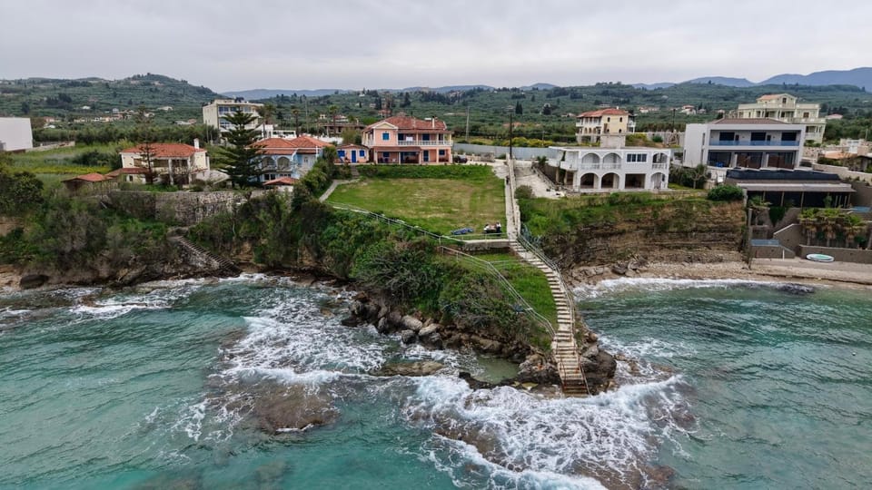 Property building, Natural landscape, Bird's eye view, Beach, Sea view
