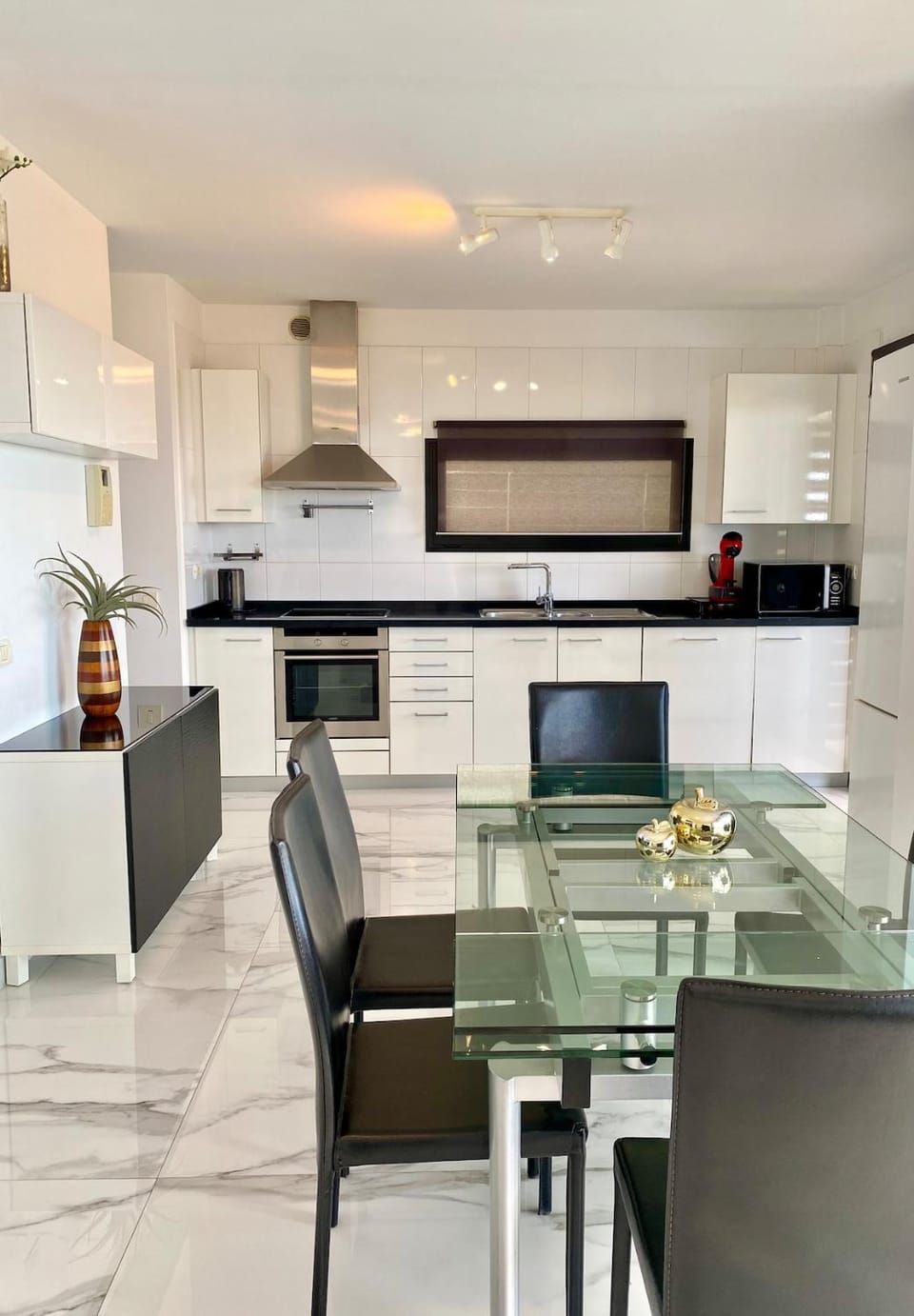 Kitchen or kitchenette, Dining area, dishwasher, oven, washing machine, dryer