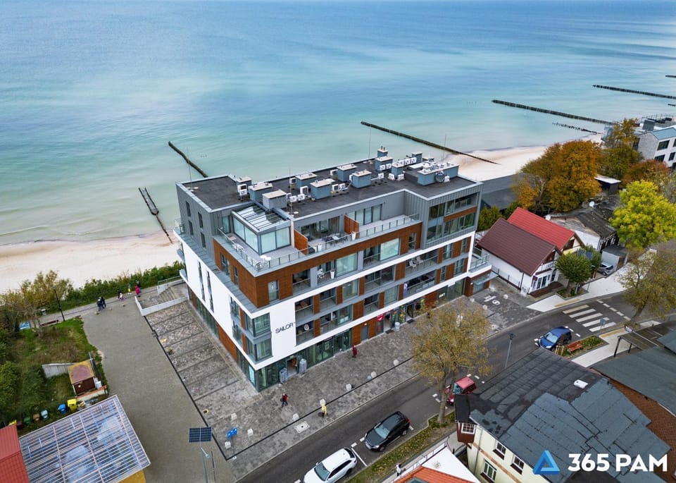 Property building, Day, Neighbourhood, Natural landscape, Bird's eye view, Beach, City view, Sea view, Street view, Location, Parking