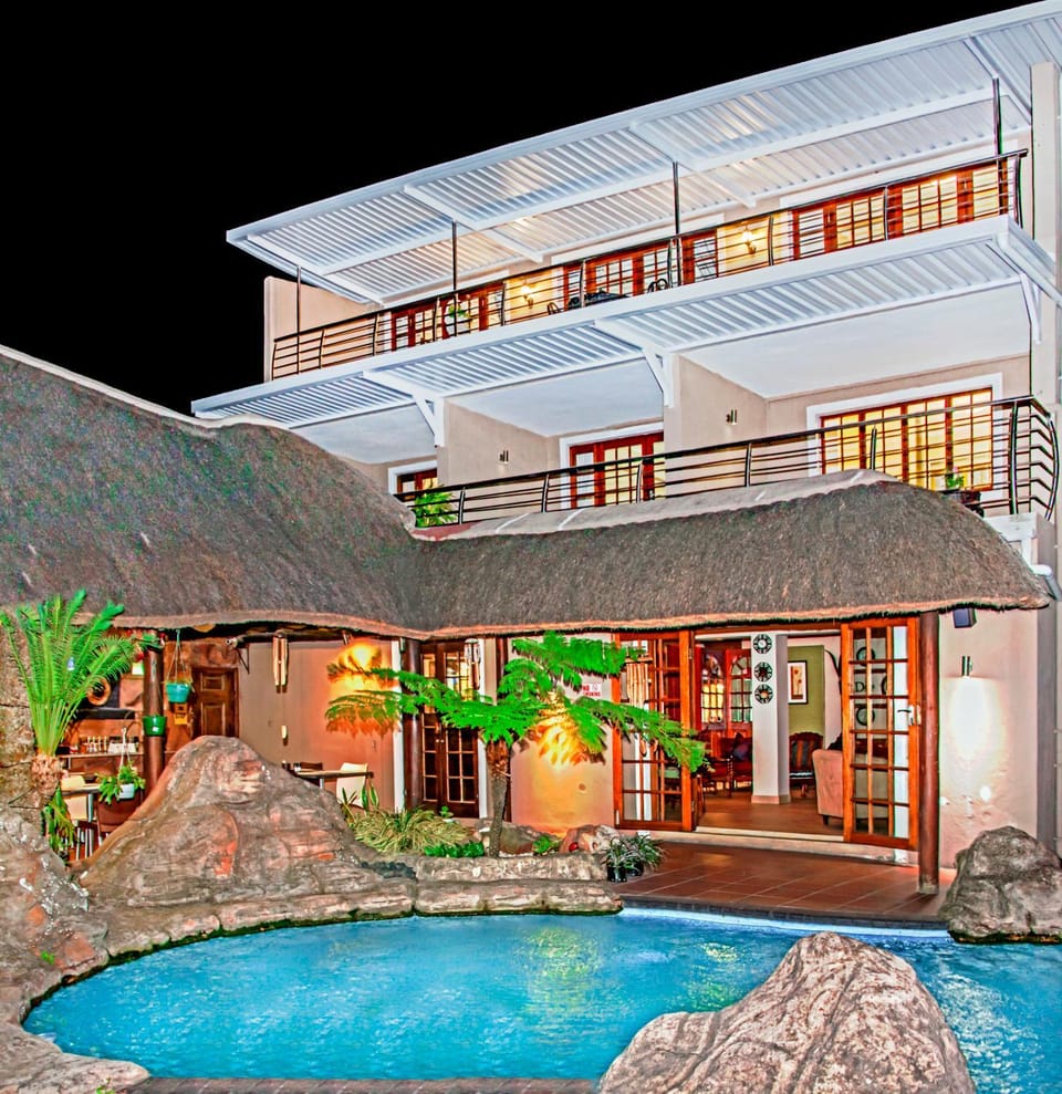 Property building, Night, Swimming pool