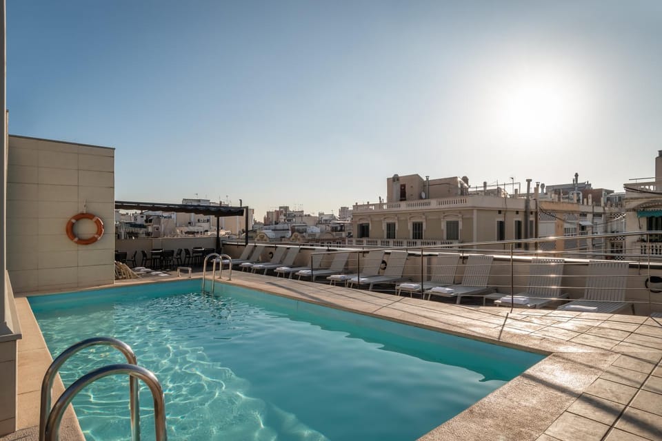 Off site, Solarium, Balcony/Terrace, City view, Swimming pool, sunbed, towels