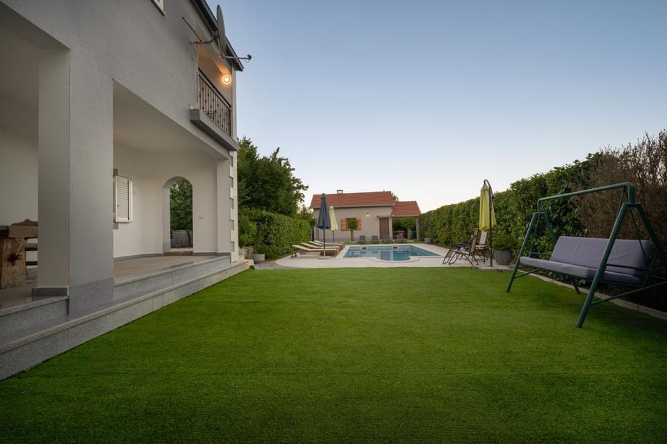 Property building, Natural landscape, Pool view, Swimming pool