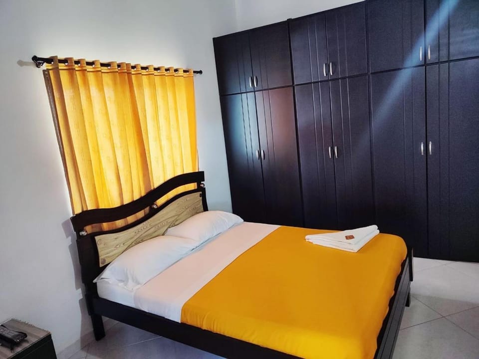 Bed, wardrobe