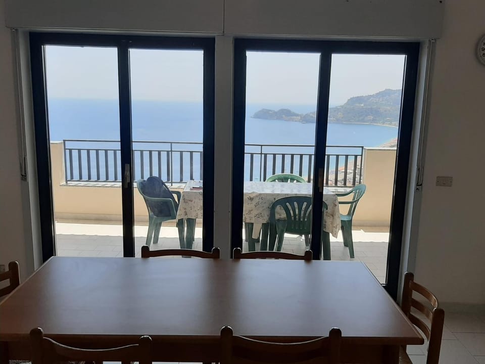 Patio, Day, Natural landscape, Balcony/Terrace, Living room, Dining area, Sea view