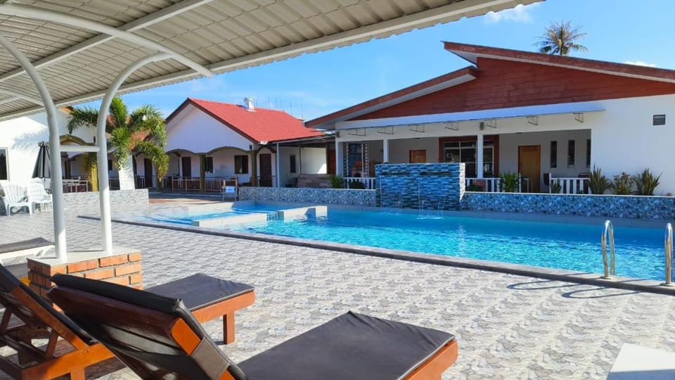 Swimming pool, sunbed