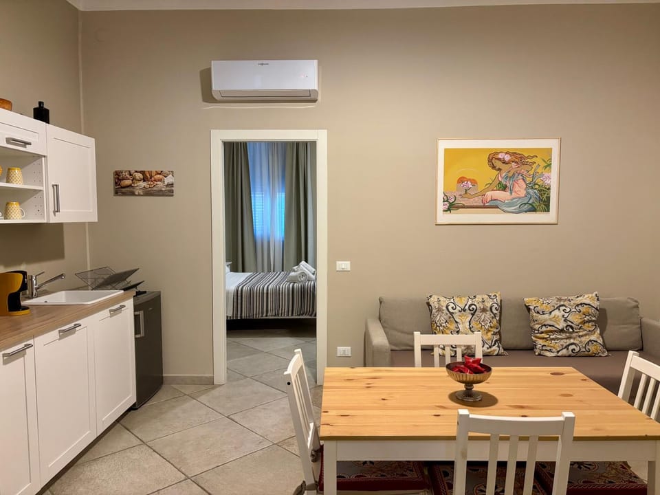 Kitchen or kitchenette, Living room, Seating area, Dining area, air conditioner