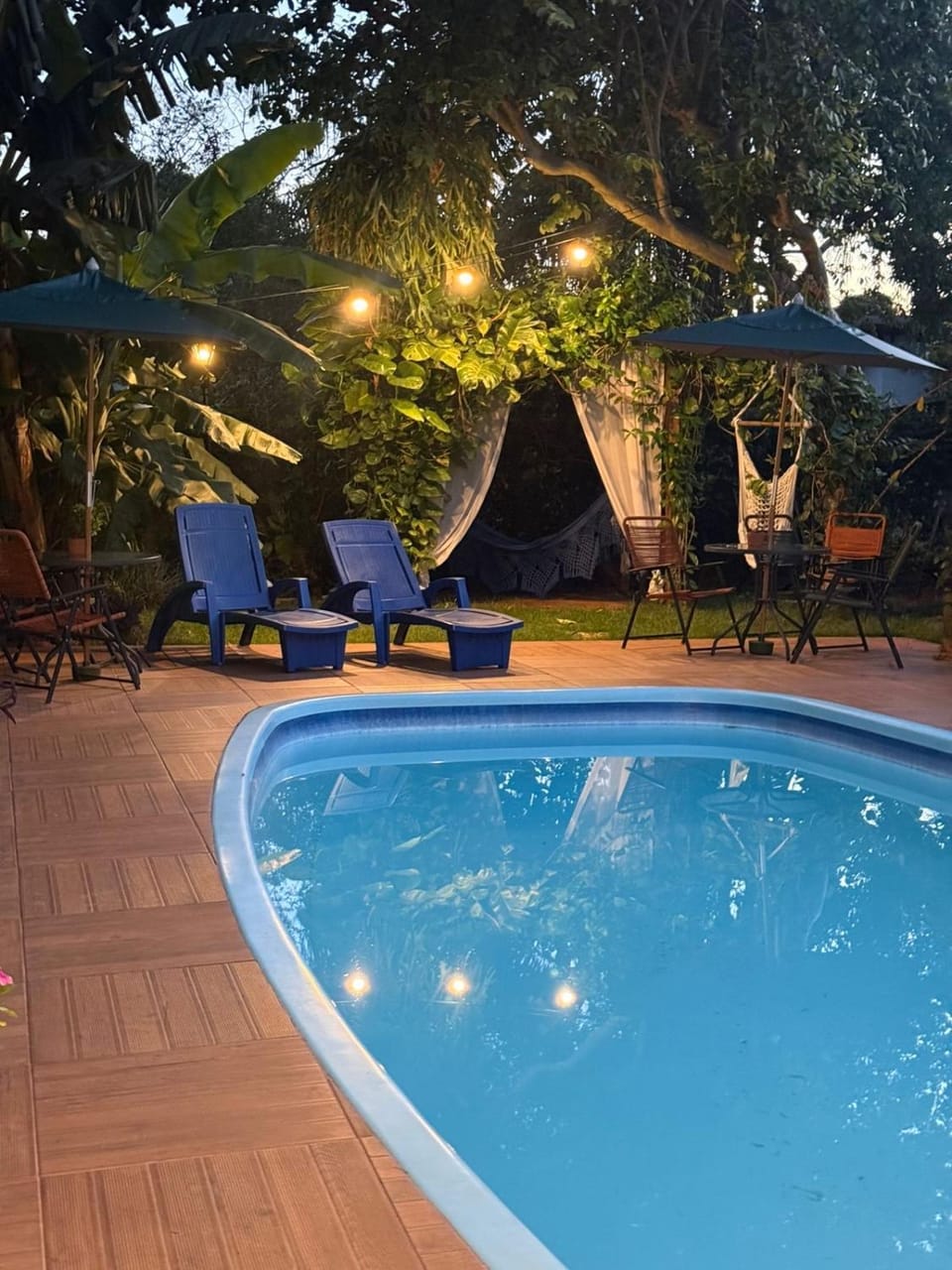 Property building, Night, Natural landscape, Garden, Garden view, Pool view, Swimming pool, sunbed
