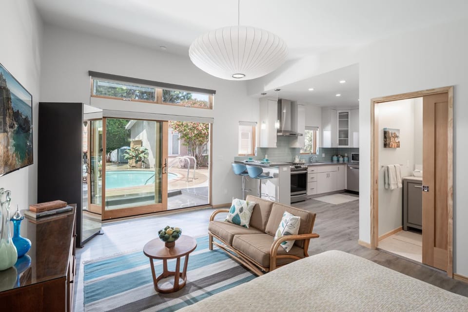 Living room, Seating area, Pool view