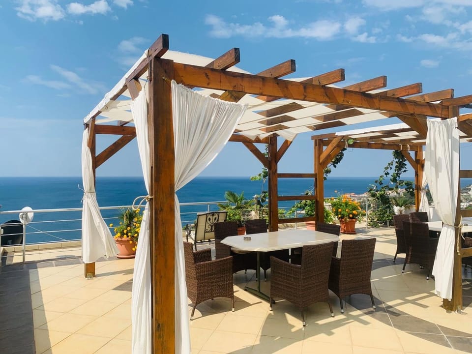 Property building, Patio, Day, Natural landscape, View (from property/room), Balcony/Terrace, Evening entertainment, Sea view, Time of day