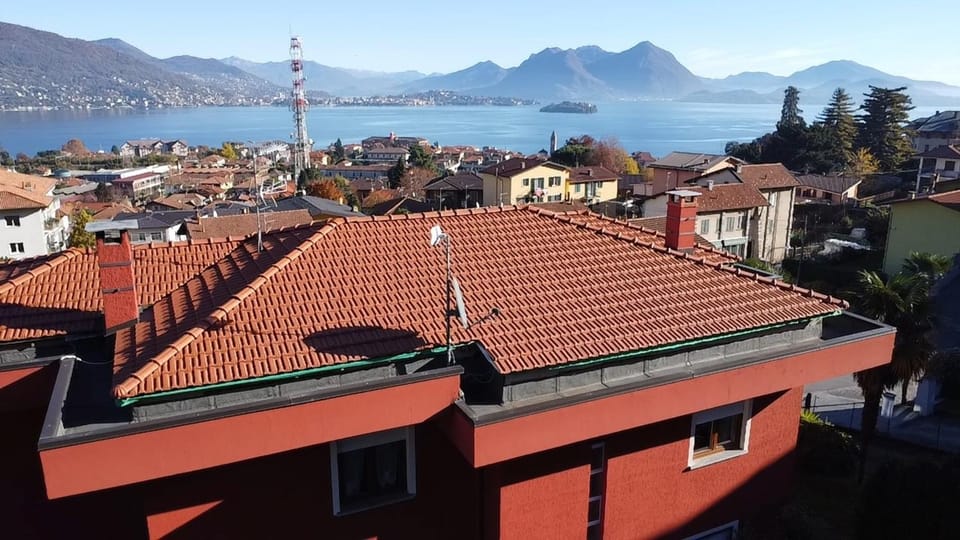 Property building, Nearby landmark, Day, Natural landscape, City view, Lake view, Mountain view