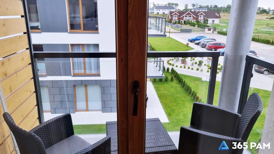 Property building, Day, View (from property/room), Balcony/Terrace, Seating area