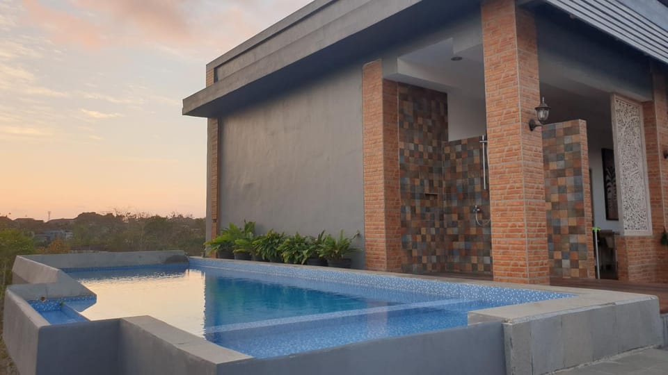 Property building, Swimming pool, Sunset