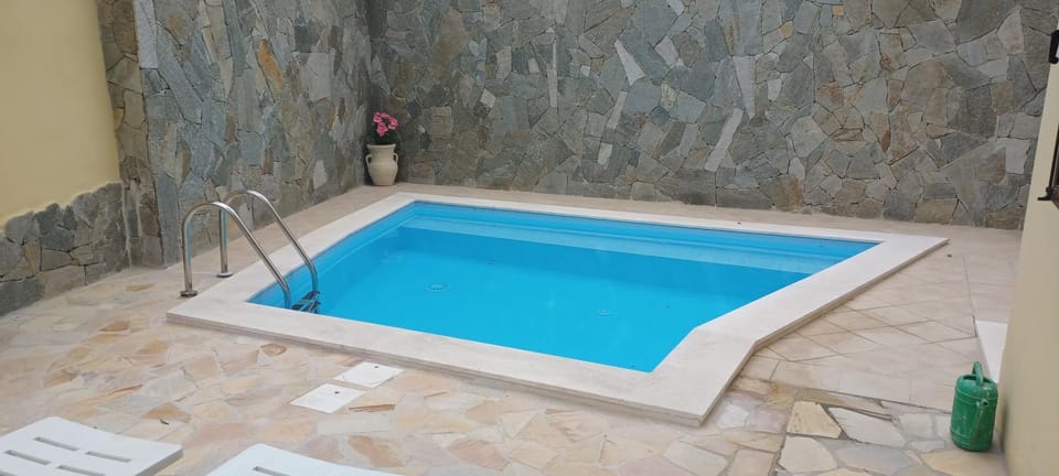 exclusive use swimming pool available from 1May to 30 October House in Cagliari