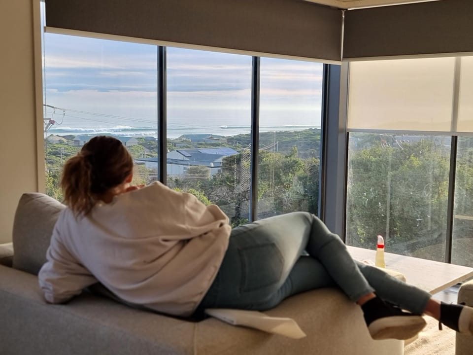 People, Natural landscape, View (from property/room), Living room, Seating area, Sea view