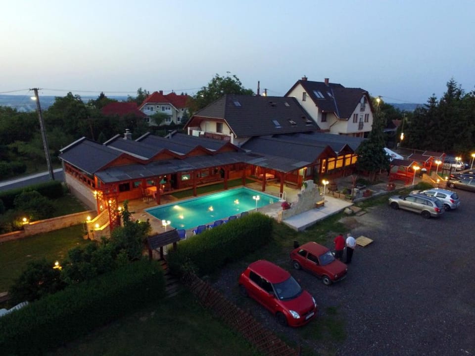 Property building, Facade/entrance, Night, Garden view, Swimming pool, Parking