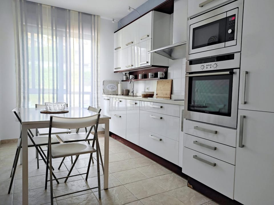 Kitchen or kitchenette, Dining area, dishwasher, microwave, oven, stove, kitchen