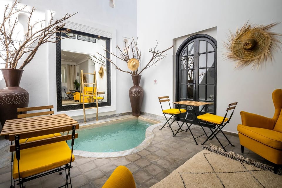 Patio, Living room, Seating area, Dining area, Pool view, Swimming pool