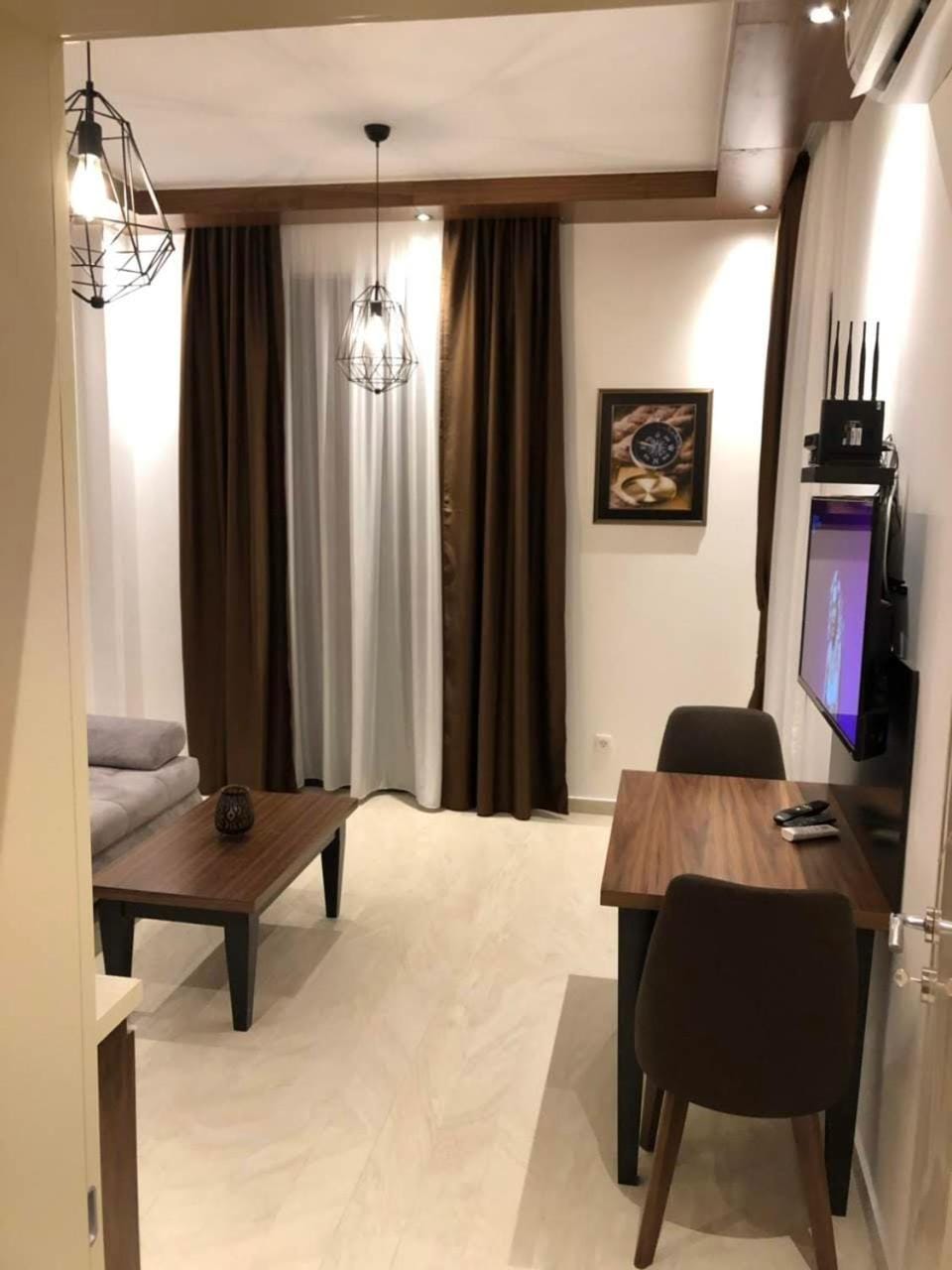 Communal lounge/ TV room, TV and multimedia, Living room, Seating area, Dining area