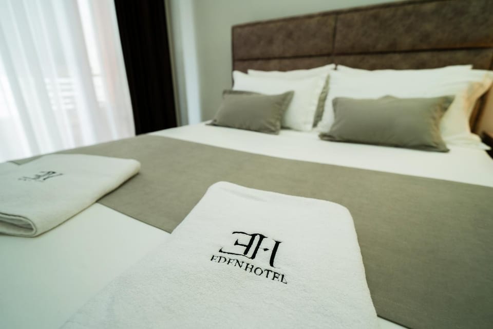 Bed, Property logo or sign, Logo/Certificate/Sign, Bedroom, towels