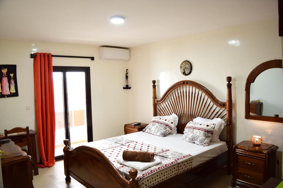 Bed, Living room, Seating area, Bedroom