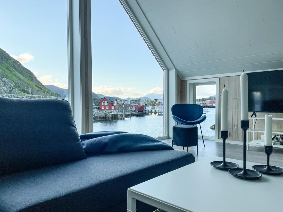 View (from property/room), Living room, Seating area, Mountain view, Sea view