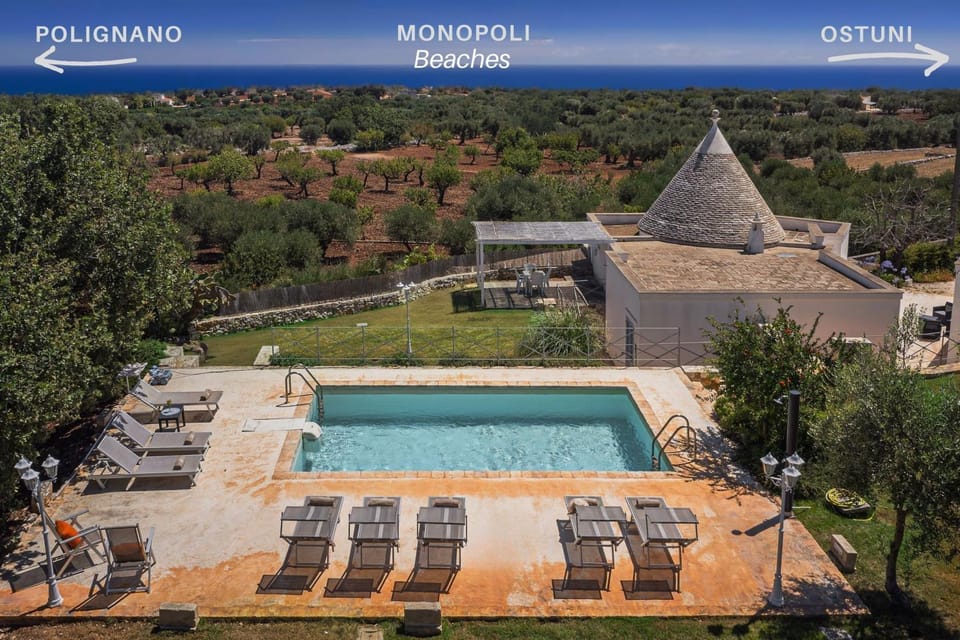 Property building, Natural landscape, Pool view, Sea view, Swimming pool