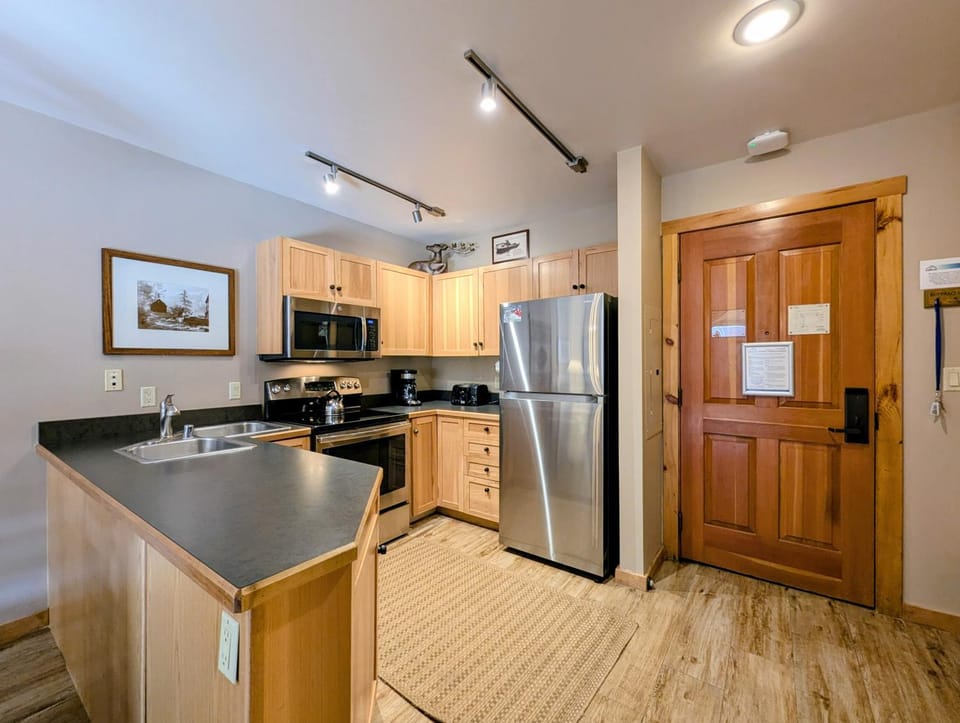 Kitchen or kitchenette, furniture, minibar, oven, stove, toaster