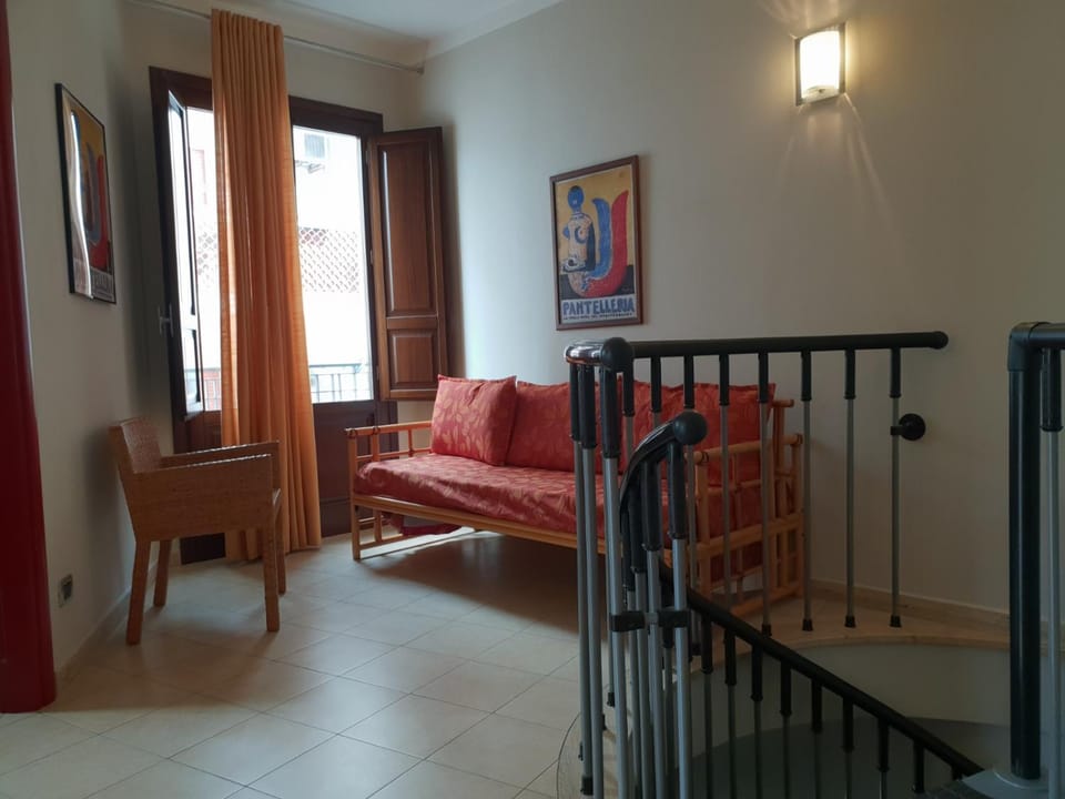 Bed, Living room, Seating area