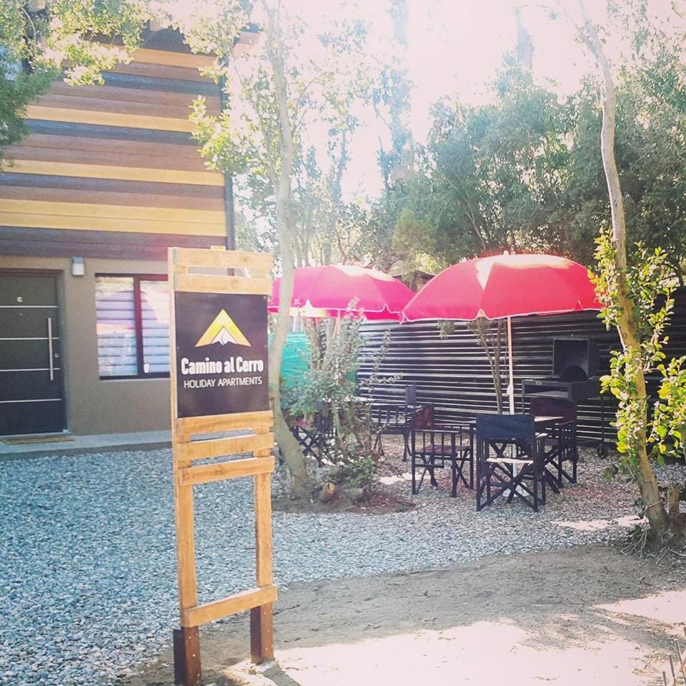 Patio, Facade/entrance, Property logo or sign, BBQ facilities, Garden