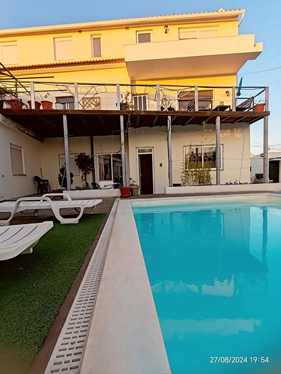 Property building, Patio, Swimming pool, sunbed