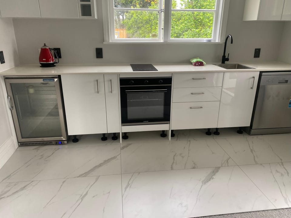 Kitchen or kitchenette, dishwasher, oven, stove, toaster