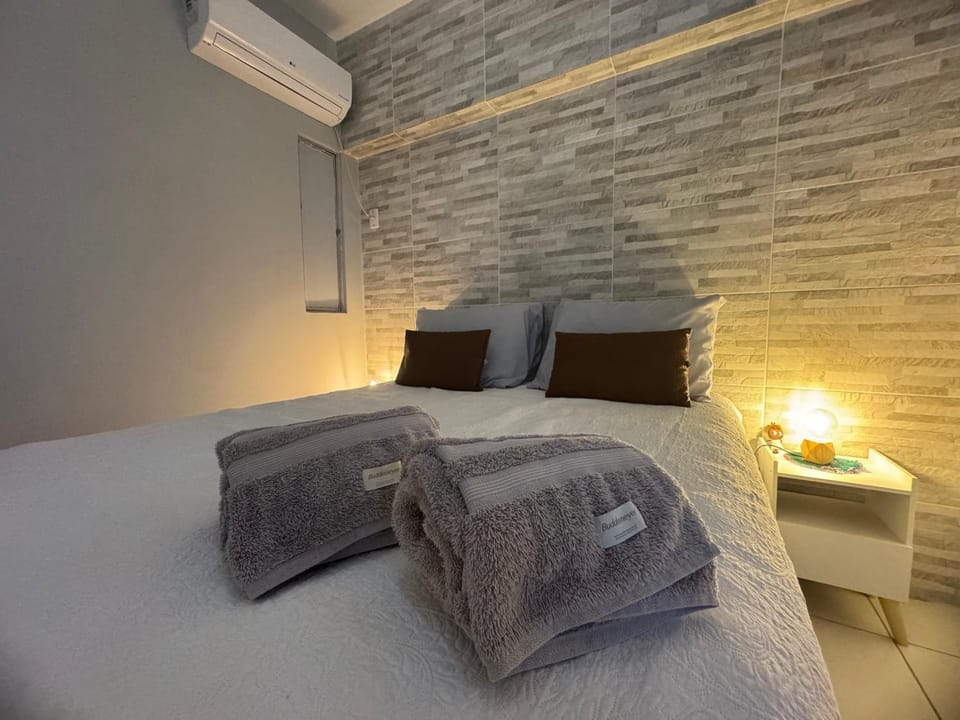 Bed, Photo of the whole room, Bedroom, towels, air conditioner
