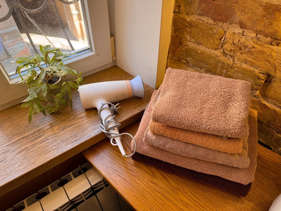 Shower, Bathroom, Decorative detail, Bath, hair dryier, towels