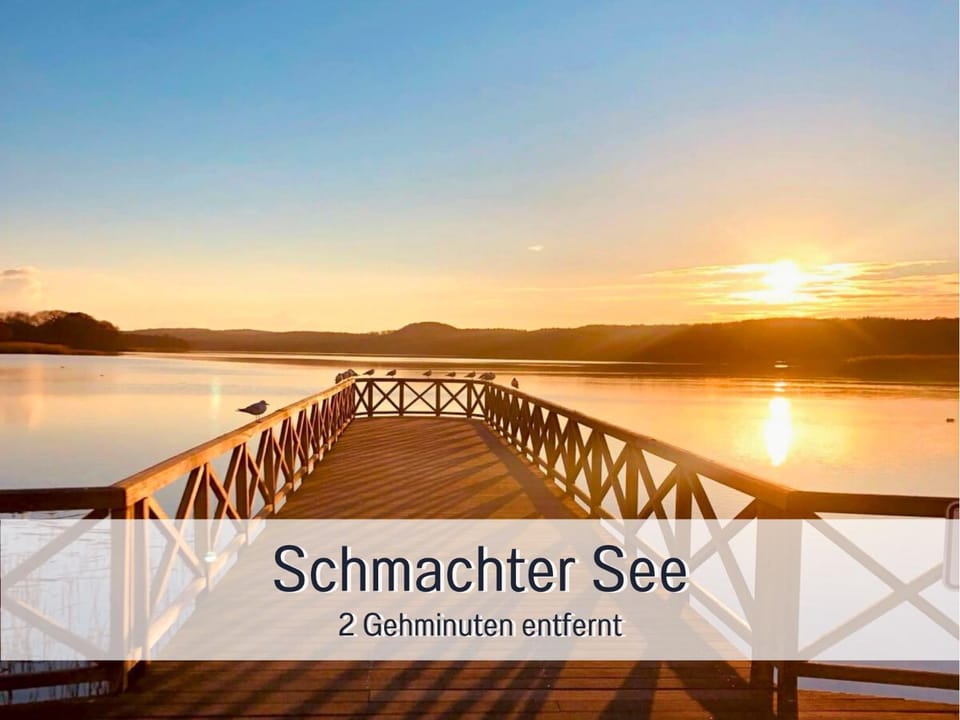 Nearby landmark, Natural landscape, Text overlay, Lake view, Sunset