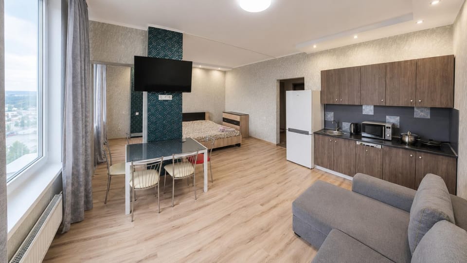 Bed, TV and multimedia, Kitchen or kitchenette, microwave, stove, kitchen, kitchen, air conditioner